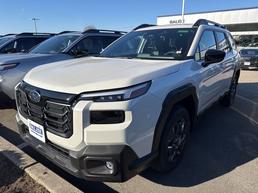 2026 Subaru Outback Premium in Crystal White Pearl — front three-quarter view