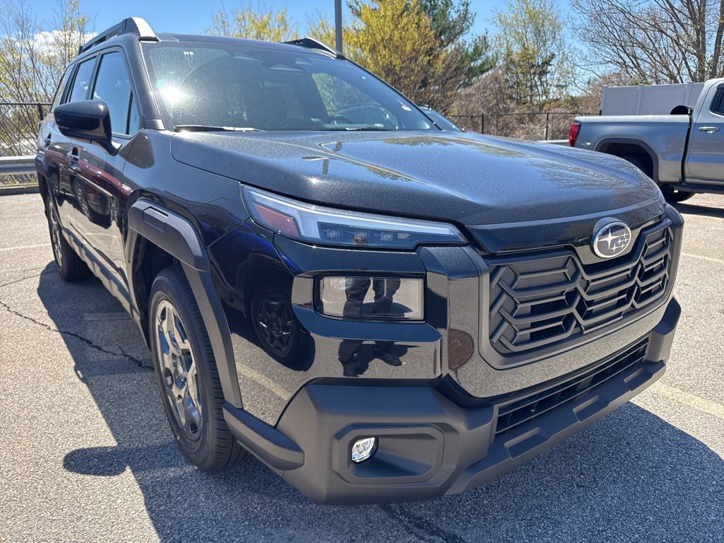 2026 Subaru Outback Premium in Crystal Black Silica — front three-quarter view